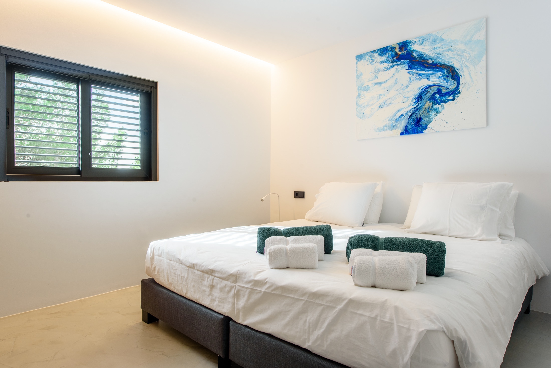 Resa Estates Ibiza villa for sale es Cubells modern heated pool bedroom.jpg